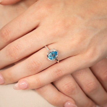 9ct White Gold Natural Blue Topaz And Diamond Ring