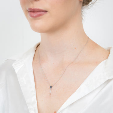 9ct White Gold 0.48Ct Blue Topaz in 10 Diamonds