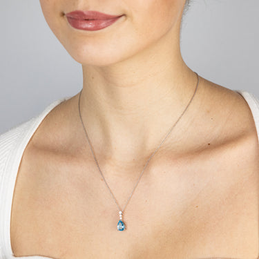 Sterling Silver Blue Topaz Cubic Zirconia Earring & Pendant Set