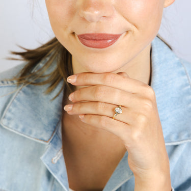 Zirconia Oval shaped center Ring in 9ct Yellow Gold