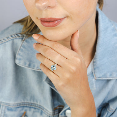 3.17 Carat London Blue Topaz Oval and Diamond Ring in 9ct Yellow Gold