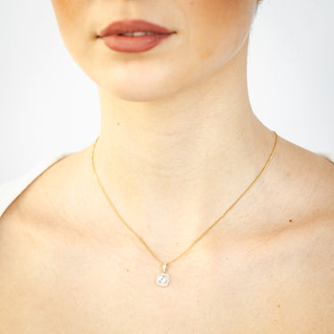 White Topaz and Diamond Pendant in 9ct Yellow Gold