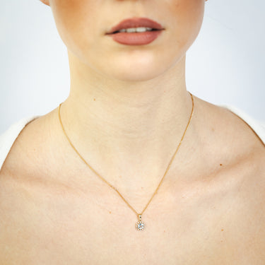 Blue Topaz and Diamond Pendant in 9ct Yellow Gold