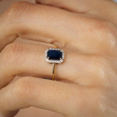 Natural Blue Sapphire and Diamond Halo Ring in 9ct Yellow Gold