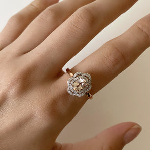 9ct Rose Gold Morganite 7x5mm 0.65 Carats and Diamonds 0.25 Carats Floral Halo Ring