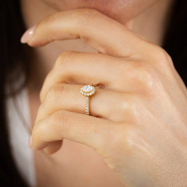 1/2 Carat Diamond Halo Ring in 18ct Yellow Gold