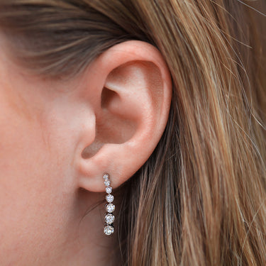 Sterling Silver 1x Diamond and Zirconia Graduated Drop Earrings