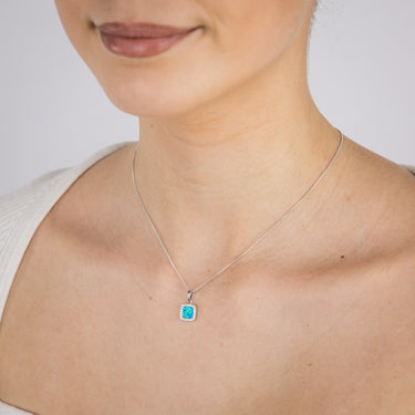 Sterling Silver Rhodium Plated Cubic Zirconia Created Blue Opal Square Pendant