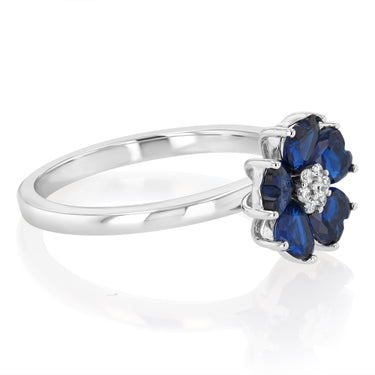 Sterling Silver Rhodium Plated White And Sapphire Blue Cubic Zirconia Flower Ring